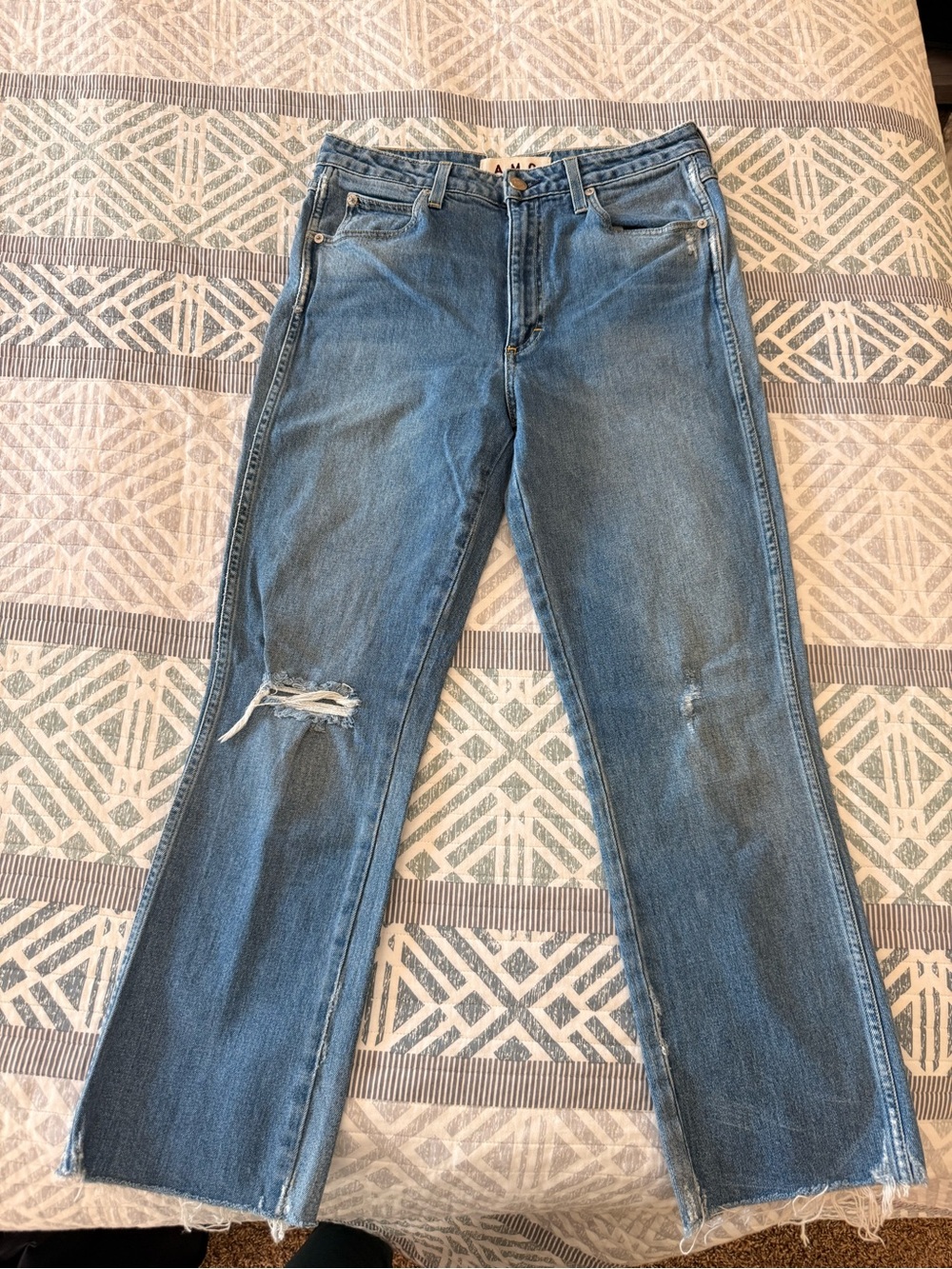 AMO Distressed Flare Jeans in Light Blue Wash